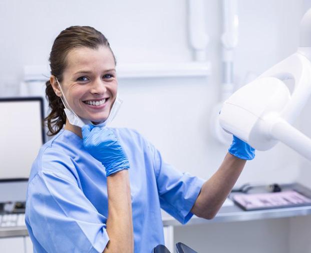 Dental hygienist smiles