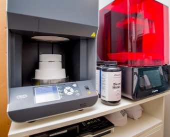 Cone beam scanning machine standing against a wall