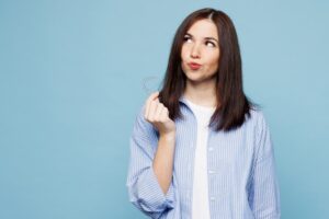 Woman wondering if she can cavities with Invisalign